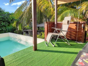 Charmante Maison à Sainte-Rose avec Jacuzzi et Piscine